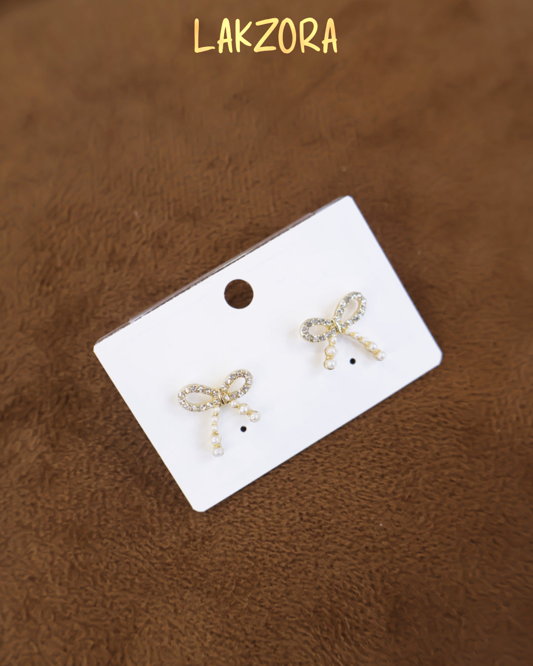 Diamond and Pearl Bow Stud Earrings